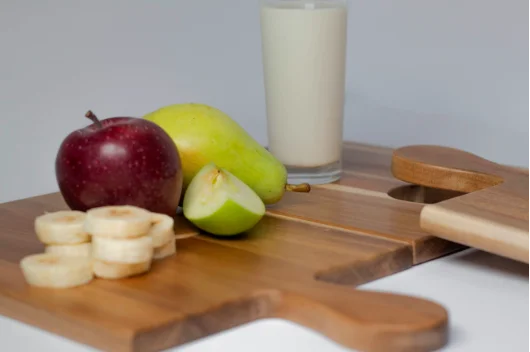 Apples on a cutting board.